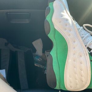 Barley used lucky green Jordan 13s bought off goat website